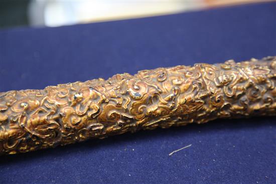 A Chinese gilt lacquered wood temple carving, 17th century possibly Zitan, total length 84cm